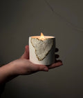 Handcraft Geode candle by the wax society held in hand